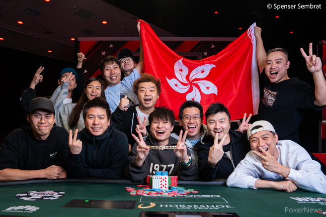 Wing Liu, celebrating with his Hong Kong rail after winning Mixed Big Bet